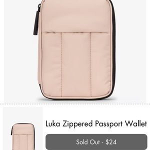 Sold out Calpak passport holder. Puffy pink